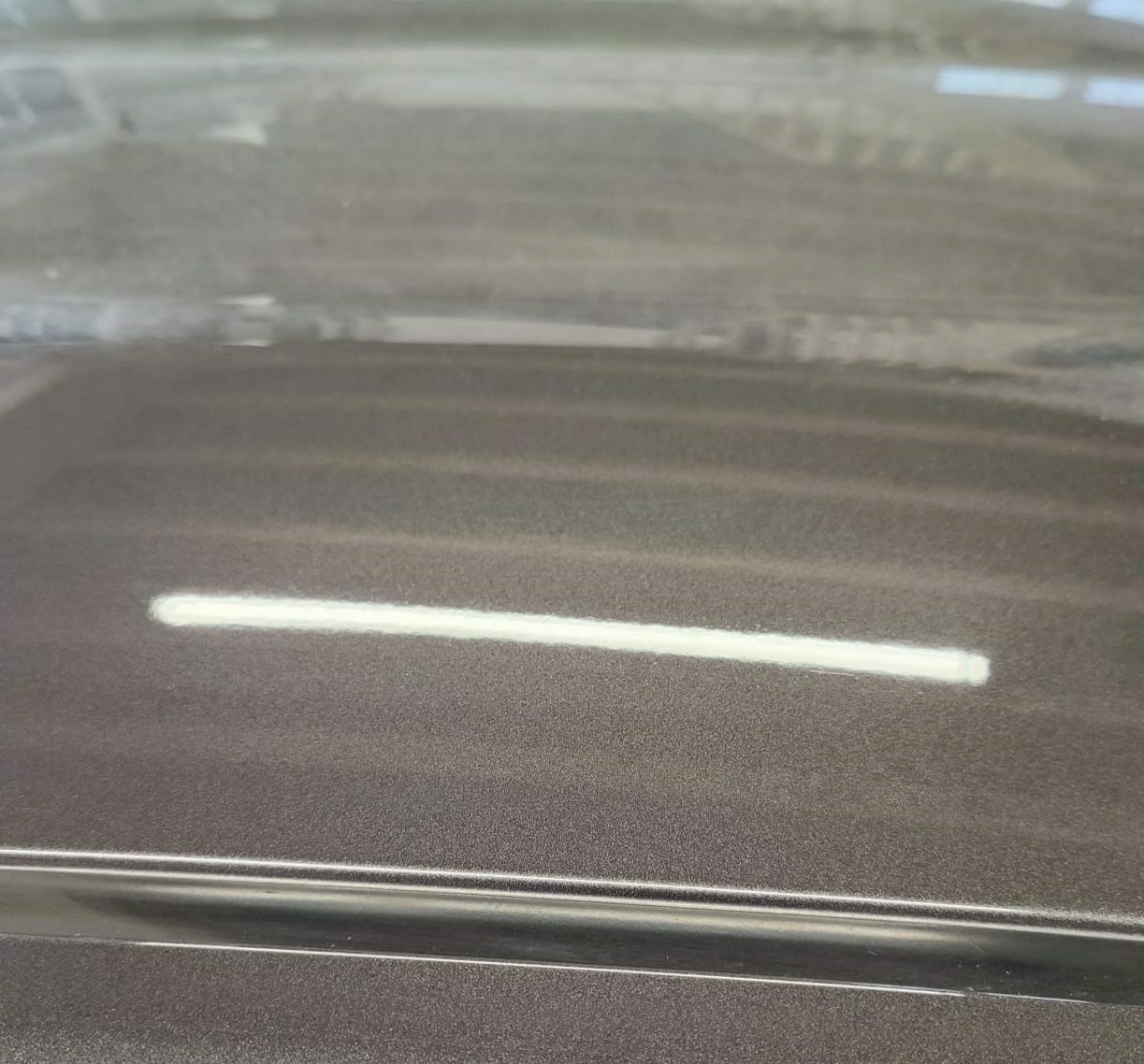 Résultat après élimination de rayures profondes sur le toit d'une voiture - Clean'Ride Hérault